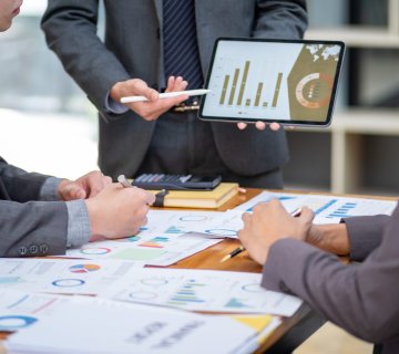 51850606 young smart business people chatting discussion meeting show information figure summary in monitor professional 360x320